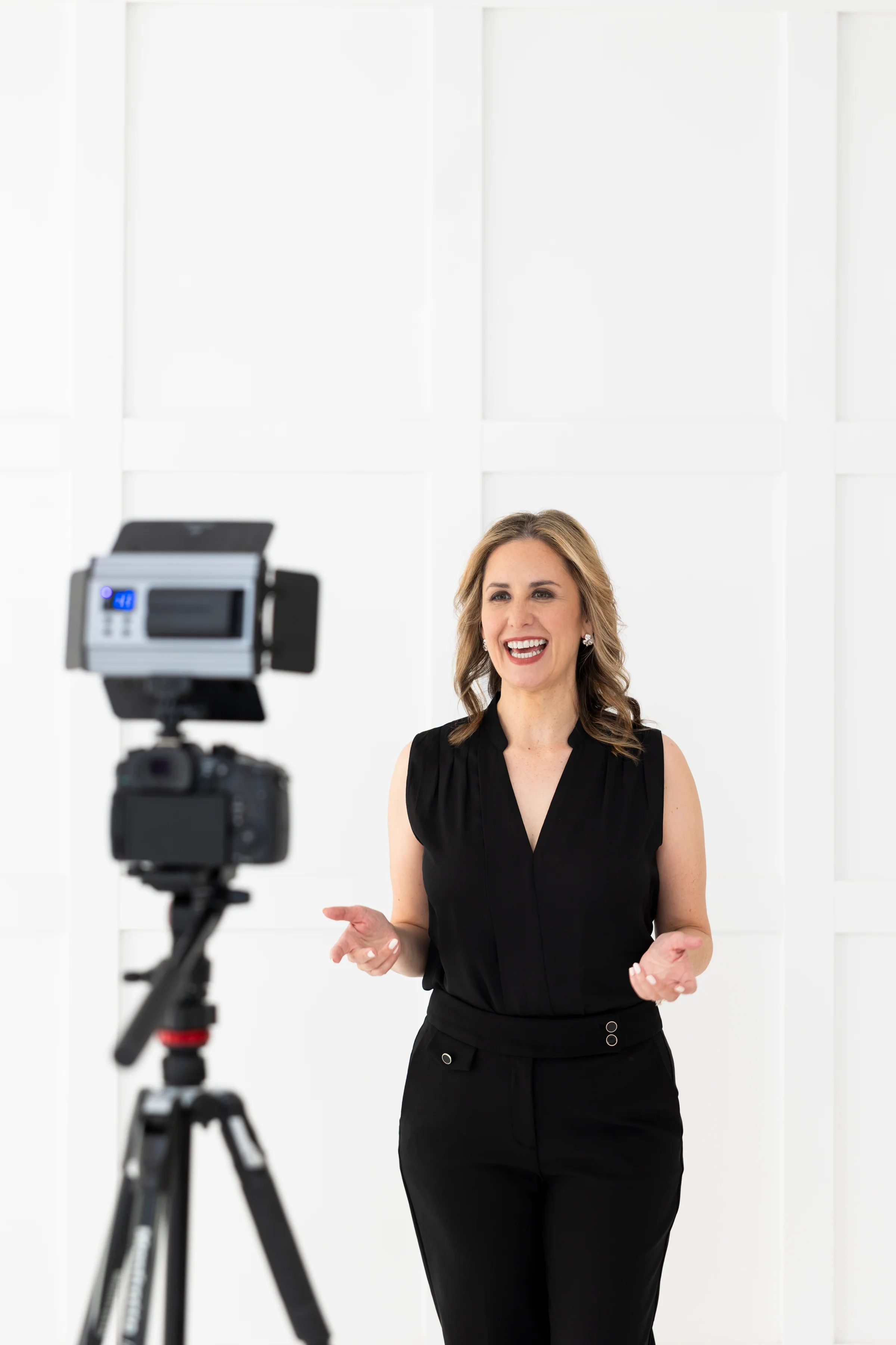 Laressa speaking on camera in a studio